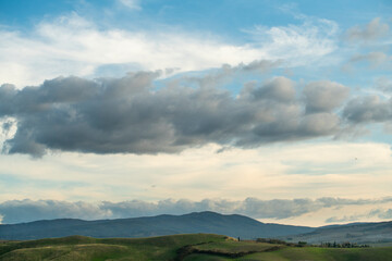 Fototapeta premium Spectacular clouds over the Tuscan countryside City of Terricciola Pisa