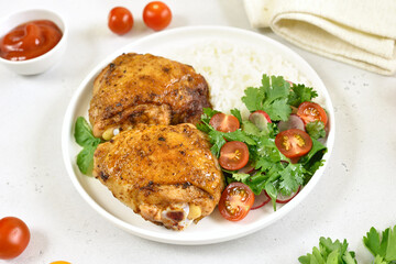 Fried chicken thighs with vegetables