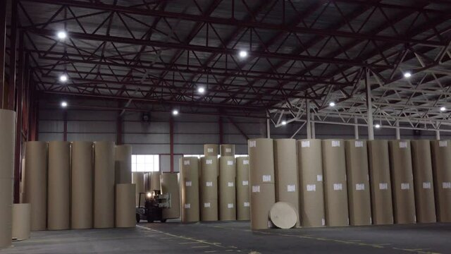 cardboard and paper mill shop. Processing of paper materials. Equipment at the paper processing plant.