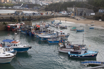 Fototapeta na wymiar Boats safely harbored in Newquay harbour Cornwall
