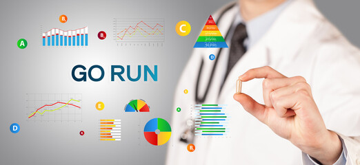 Nutritionist giving you a pill with GO RUN inscription, healthy lifestyle concept