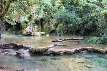 Jura Tufs waterfall, with its spectacle limestone sculptures
