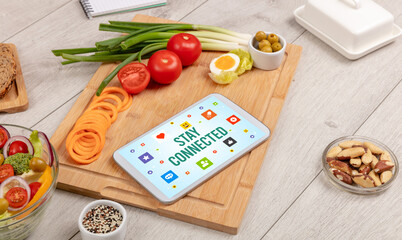 Healthy Tablet Pc compostion with STAY CONNECTED inscription, Social networking concept