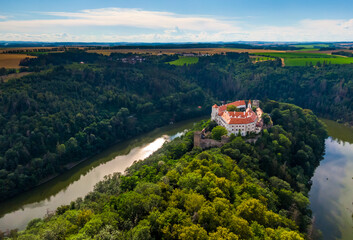 Fototapeta na wymiar Aerial view of Bitov castle near Dyje river. Landscape panoramic view of medieval castle on top of hill with forest around. South Moravia region, Czech republic.