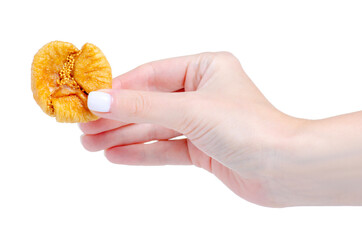 Dried figs in hand on white background isolation