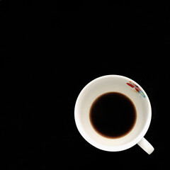 cup of coffee on black