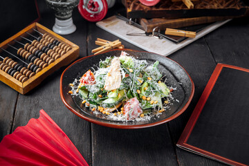 Chicken salad with lettuce and pine nuts