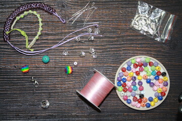 Making jewelry, home workshop background.