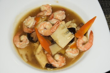 Cleaned and Cooked Shrimps in the Plate With Sauce