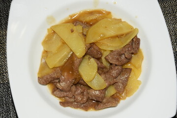 Beef With Potatoes in the Plate