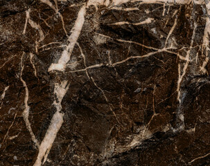 Textured background of black marble with white veins. Big plan. Top view. Copy Space.