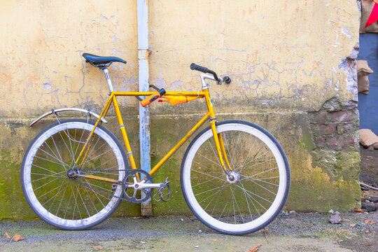vintage Bicycle on the background of an old wall