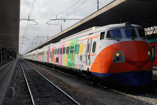 Colorful commuter electric train in Termini Station Rome, Italy - May 15, 2007