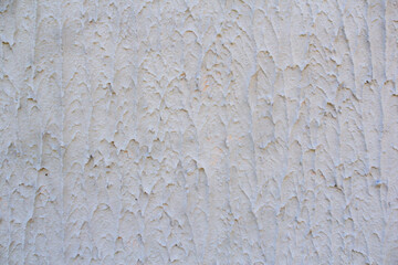 Gray textured wall. Decorative plaster.