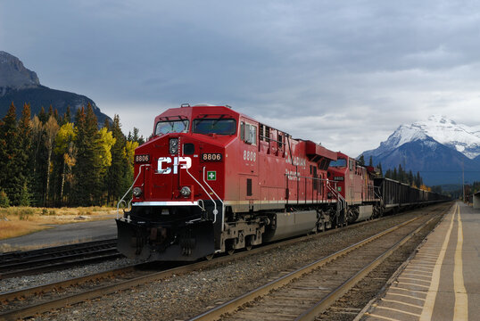 Red freight train at Banff station Alberta Banff, Canada - October 9, 2007