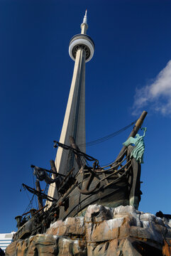 Toronto, Canada - November 23, 2007: Black Pearl Pirate Ship In Toronto With The CN Tower