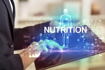 Electronic medical record with NUTRITION inscription, Medical technology concept