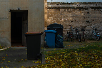 Garbage place in a backyard, garbage cans in a Berlin backyard