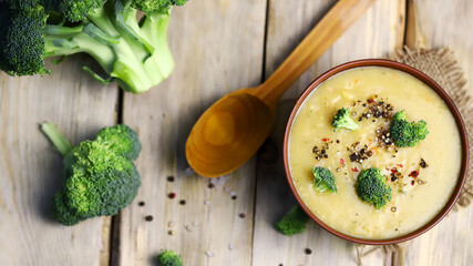 Selective focus. Vegetable cream soup with broccoli in a bowl. Healthly food. Delicious vegan puree soup.