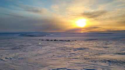 Sunrise over the hamlet of Sachs Harbour on Banks Island Northwest Territories Canada