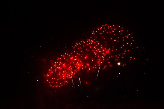 Beautiful red firework isolated on black background