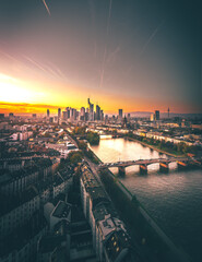 Fototapeta na wymiar Frankfurt prospects. Great view over the city of Frankfurt in Germany. In the evening with backlight and sunset. beautiful sky of all colors. Hauptwache, römer, main