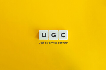 User Generated Content (UGC) banner. Block Letters on Bright Yellow Orange Background.