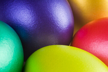 Colored easter eggs - detail. A bunch of pearl colored easter eggs. Full frame close-up. Studio shot