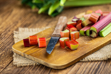 Chopped Rhubarb on an old wooden table (close up shot)