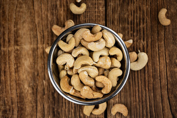 Roasted Cashew Nuts (close up shot; selective focus)
