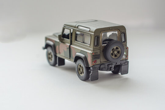 military camo-colored toy car. All-terrain military car waiting for soldiers.