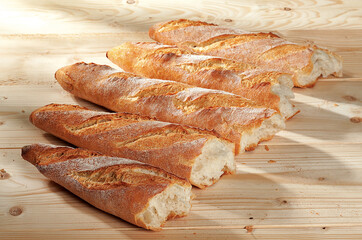 Baguettes in a row. Classical french baking. 
