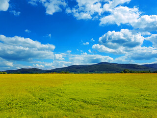 Mountain landscape natural travel background in the summer season with beautiful sky