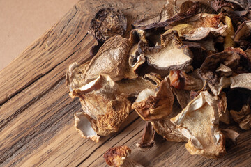 dried Porcini mushrooms on a wooden board.