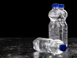 Bottles of sparkling water (chilled; close up shot)