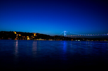Fatih Sultan Mehmet Bridge and Rumeli Fortress at night in Istanbul,Turkey
