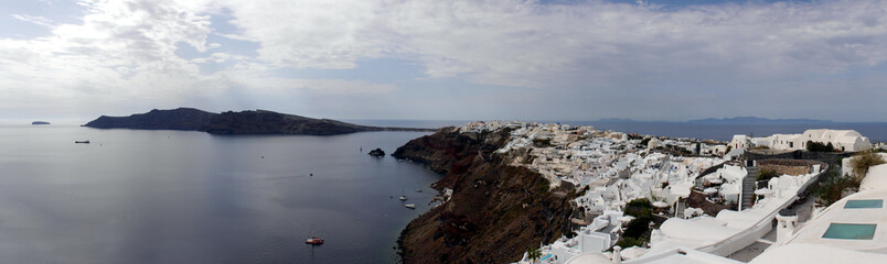 Magic Oia, Sanorini island Greece. 
 Panoramic views of the historical part of the city of Oia. Streets and houses of the old city.