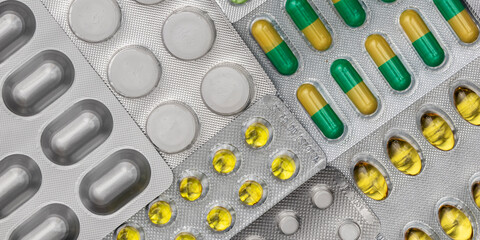 Different medicines. Tablets, pills in blister pack. Medications drugs, overhead, medical concept