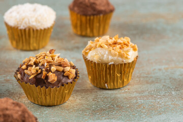 Brigadeiro is a common Brazilian dessert. Delicious chocolate candy Brigadeiro on a table