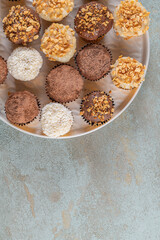 Brigadeiro is a common Brazilian dessert. Delicious chocolate candy Brigadeiro on a table