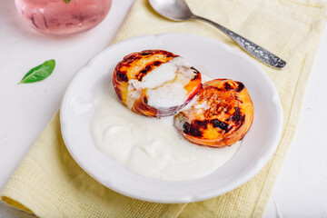 Oven Baked Peaches with Honey and Whipped Cream