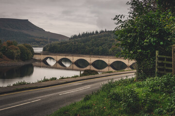 Fototapeta premium Bridge over the Ladybower Reservoir, landscape, Peak District National Park, England, Europe
