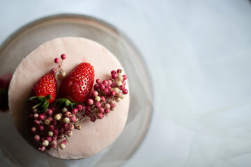 Strawberry, pink special day cake. Close-up