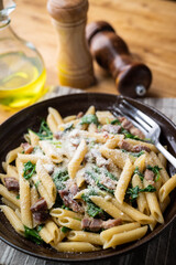 boiled penne with pancetta and arugula