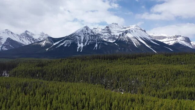 Aerial view of snowy mountains and frozen lakes
