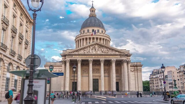 National pantheon building timelapse, front view with street and people. Traffic on the street, cloudy weather at summer day. Paris, France