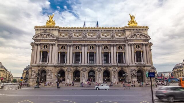Palais or Opera Garnier The National Academy of Music timelapse hyperlapse in Paris, France. People walking around and traffic on the street.