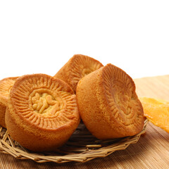 Mid-Autumn Festival moon cake on white background（Non-English texts translation :sweet red bean paste）
