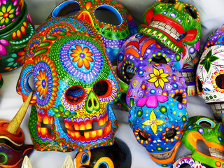 Obraz premium Colorful masks. Handicrafts souvenirs from Cotopaxi province of Ecuador. Masks represent different characters of ecuadorian folk culture.