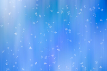 Abstract colorful blue, pink, white blurred background with falling snowflakes
